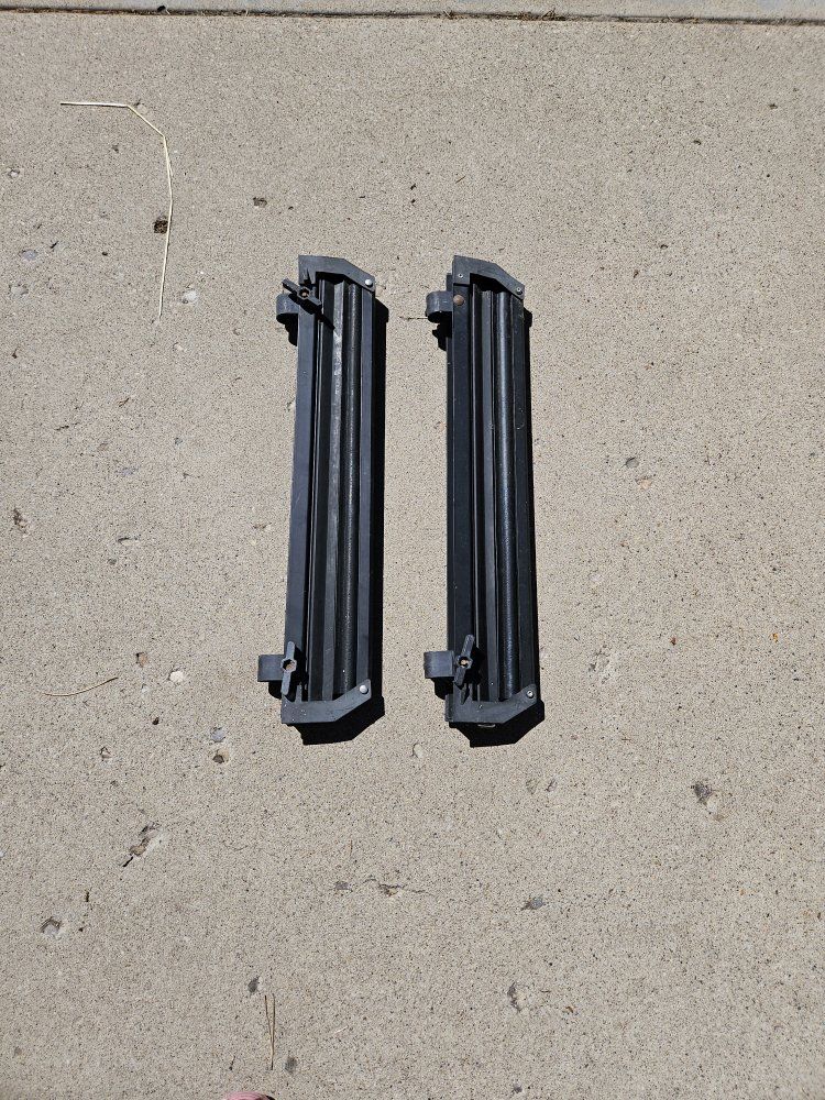 Black Ski Rack Attachment Set - Universal Mount for Car Roof, Used Good Condition Will fit a snowboard.