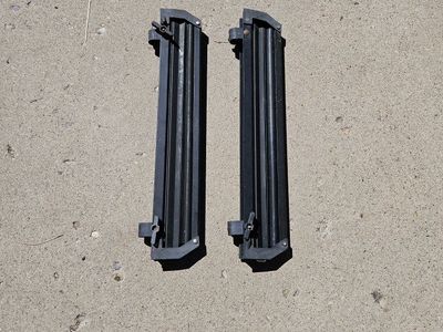 Black Ski Rack Attachment Set - Universal Mount for Car Roof, Used Good Condition Will fit a snowboard.