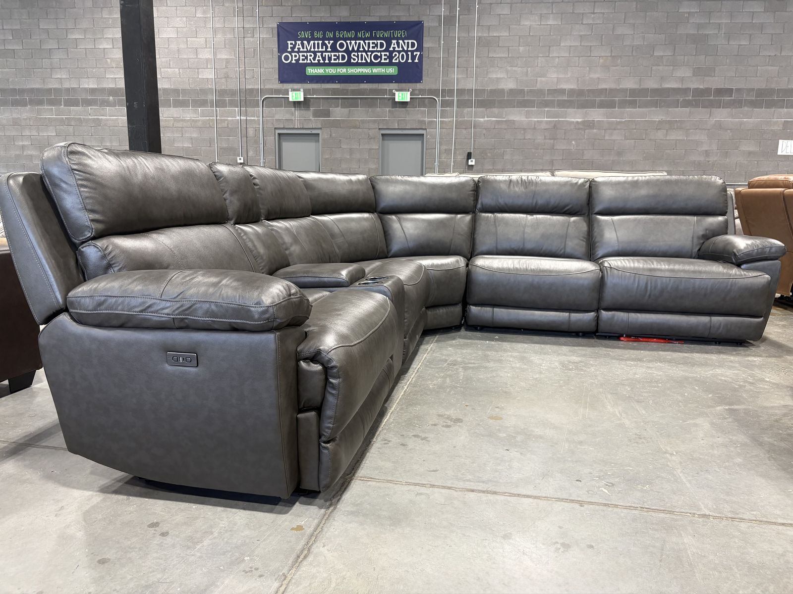 NEW LEATHER RECLINING SECTIONAL