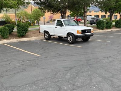 Used White Ford Ranger Pickup Truck, Likely 1990s Model, Runs Well