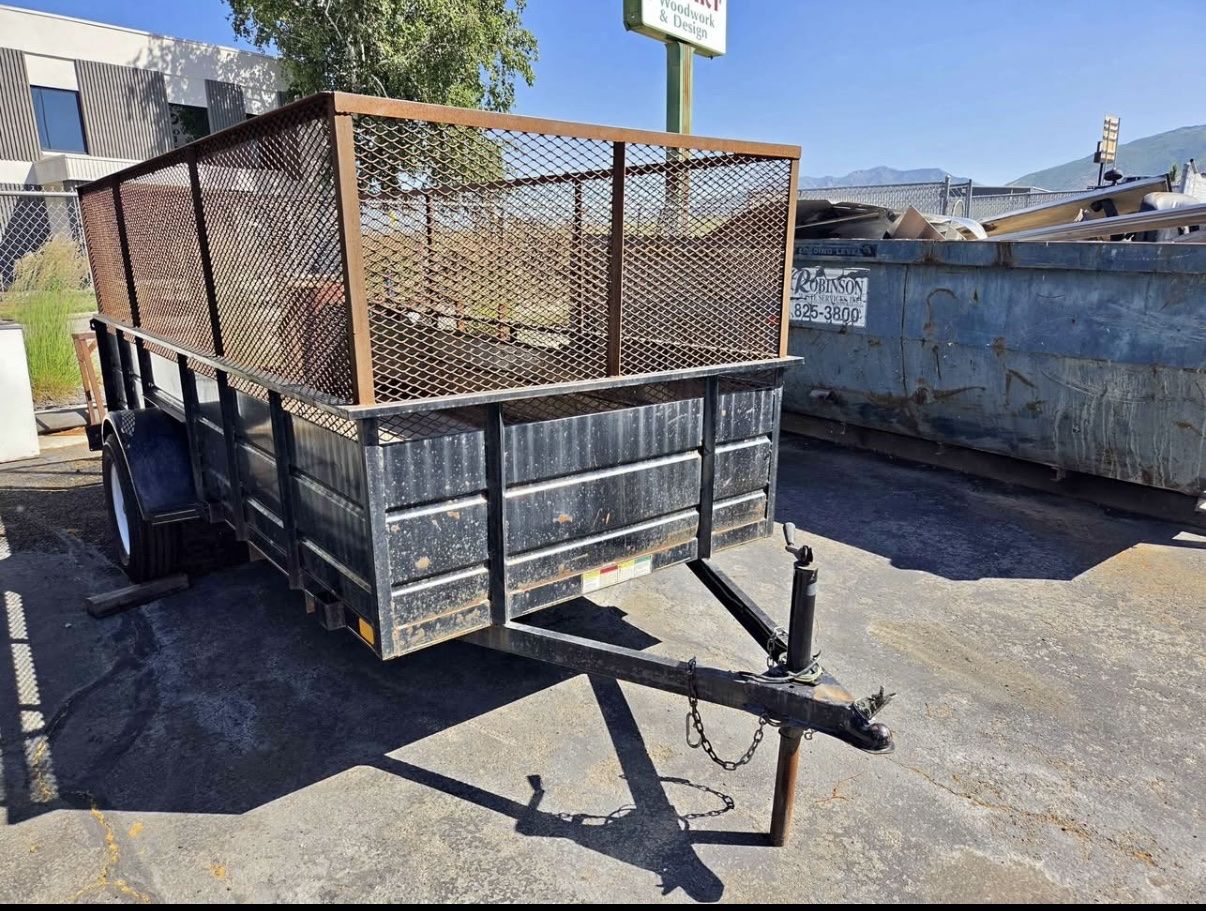 Utility Trailer with High Mesh Sides and Wood Floor