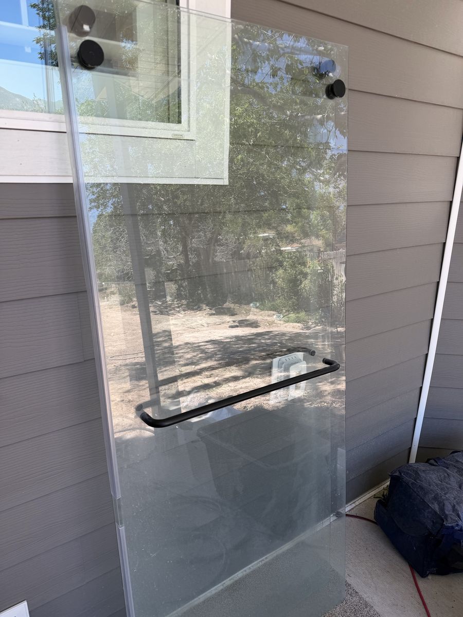 Glass Shower Door with Black Hardware