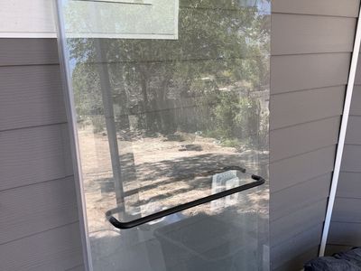 Glass Shower Door with Black Hardware