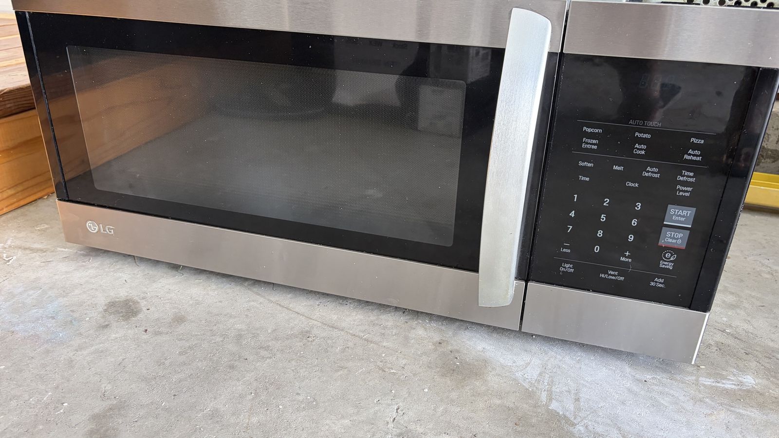 LG Stainless Steel Over-the-Range Microwave with Auto Touch Features, Used