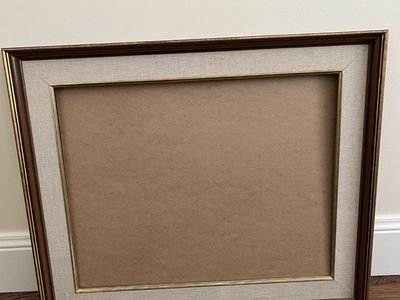 One large solid wood picture frame no glass 3 other smaller frames with glass. All excl condition.