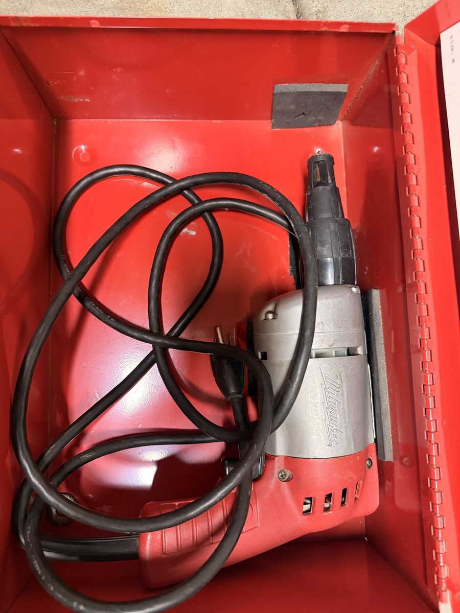 Milwaukee Corded Electric Tool with Red Metal Carrying Case