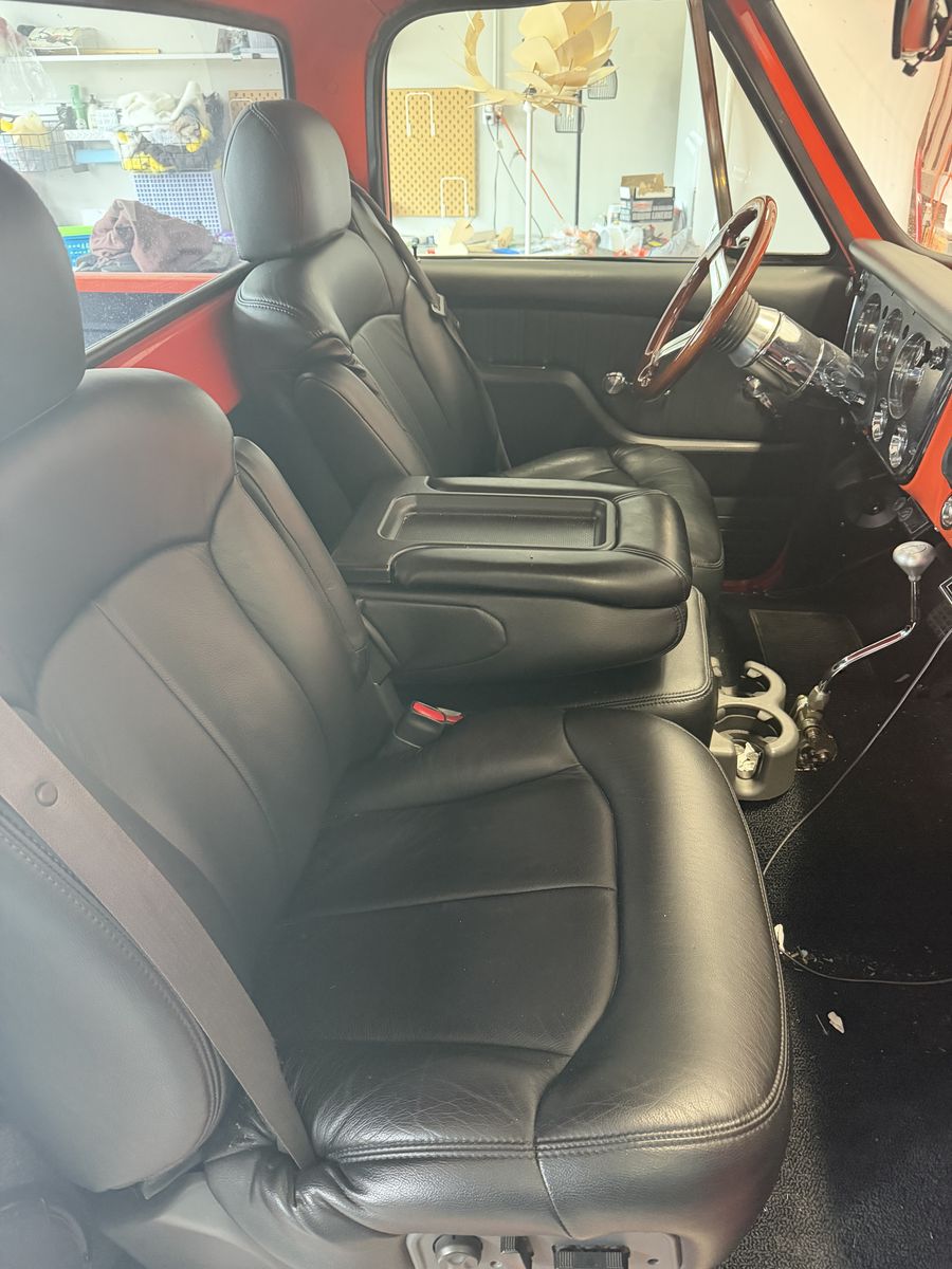 Powered seats from a Cadillac.  Black leather.