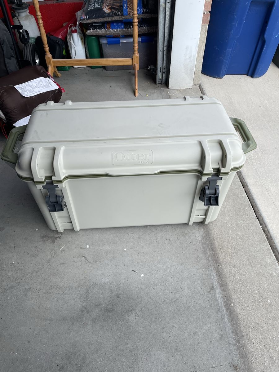 OtterBox Venture 45 Hard Cooler - Tan/Green - Durable Outdoor Ice Chest with Dry Basket