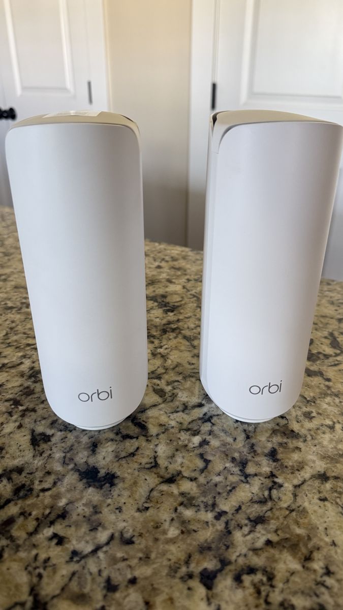 Orbi 370 mesh router and satellite
