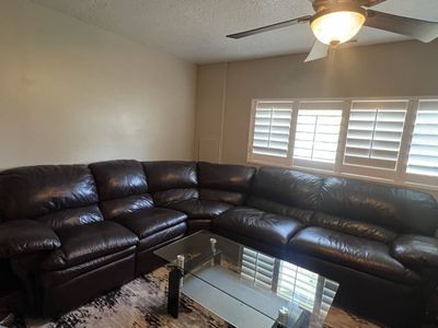Dark brown leather sectional