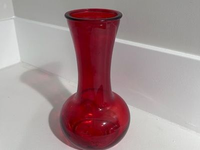 red flower vase