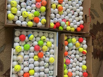 100 used golf balls