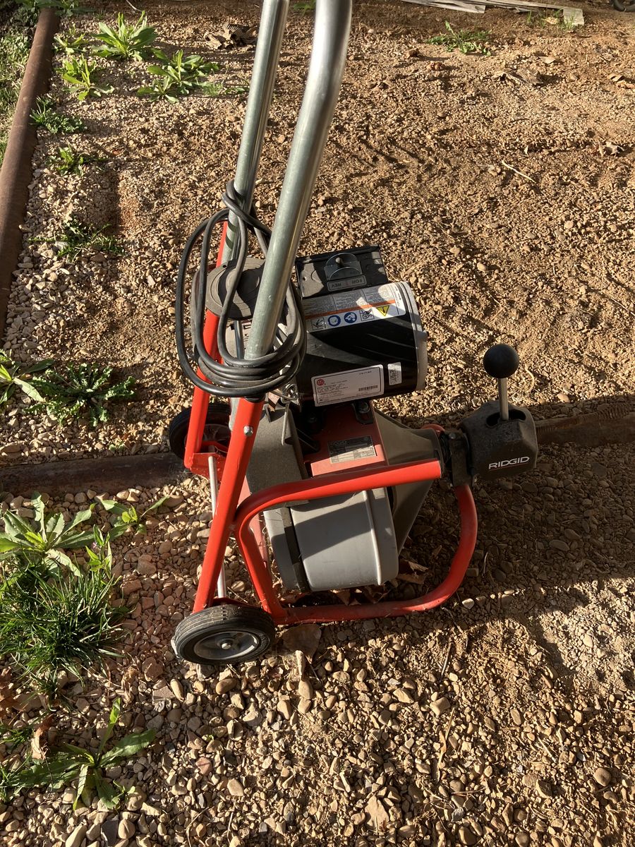 Sewer snake cleaner