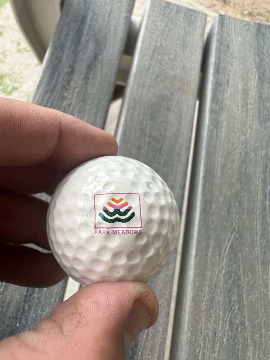 Vintage Park Meadows logo golf ball