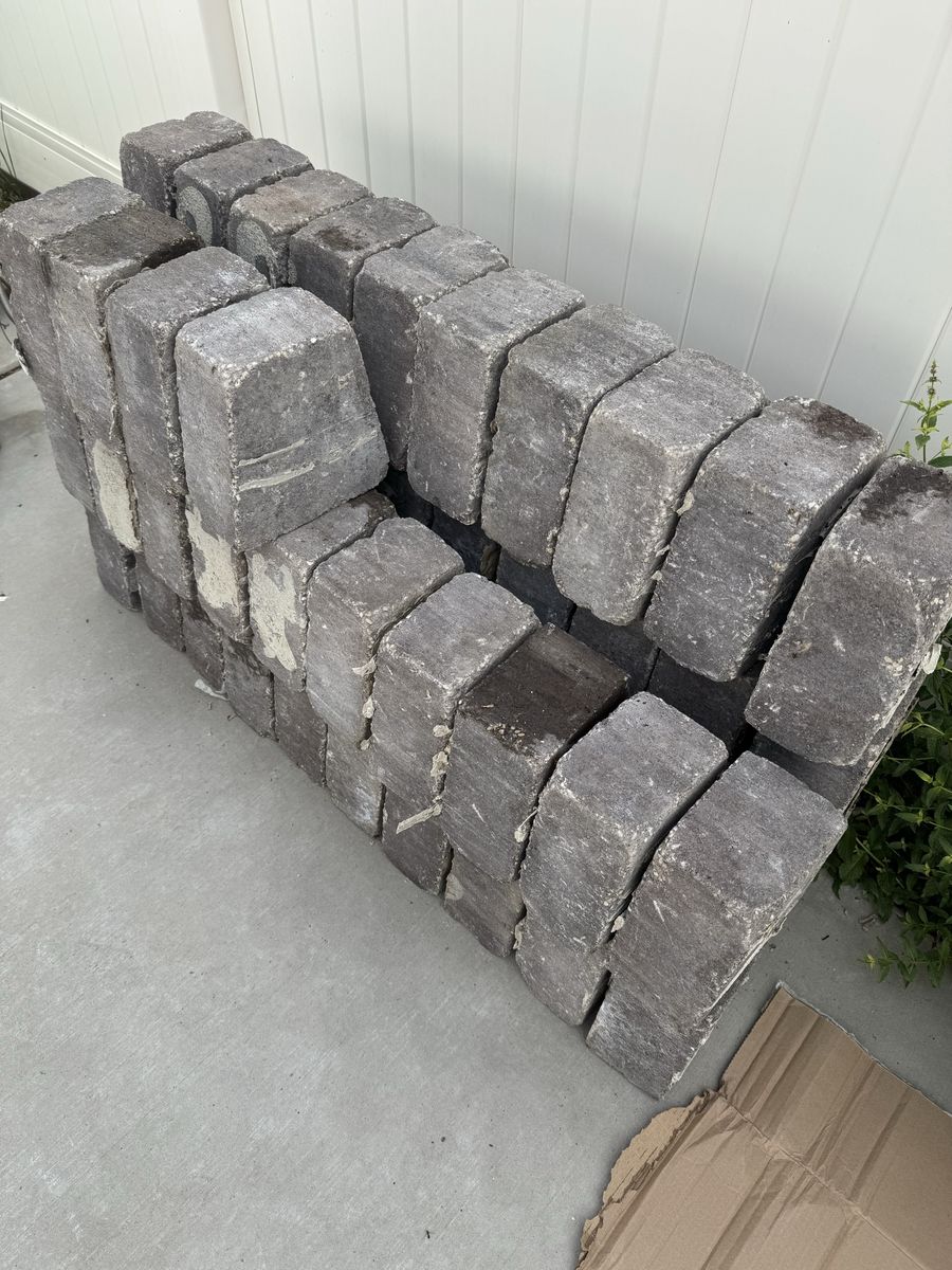 Used Gray Paver Stones for a fire pit.