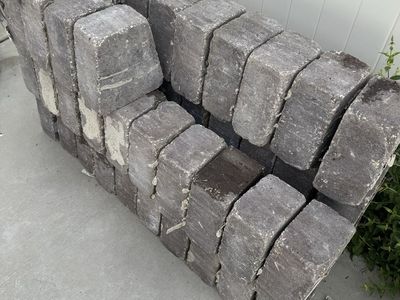 Used Gray Paver Stones for a fire pit.