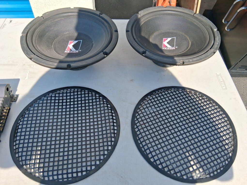 2)  Kicker- Powerfull Old School 12 inch Kicker Subs with Steel Griles. Like New!