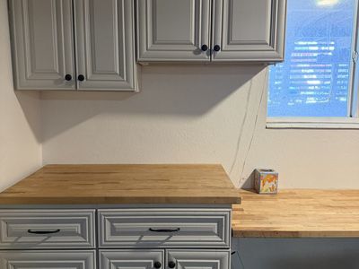 Kitchen Cabinets, 29, raised panel cream in color