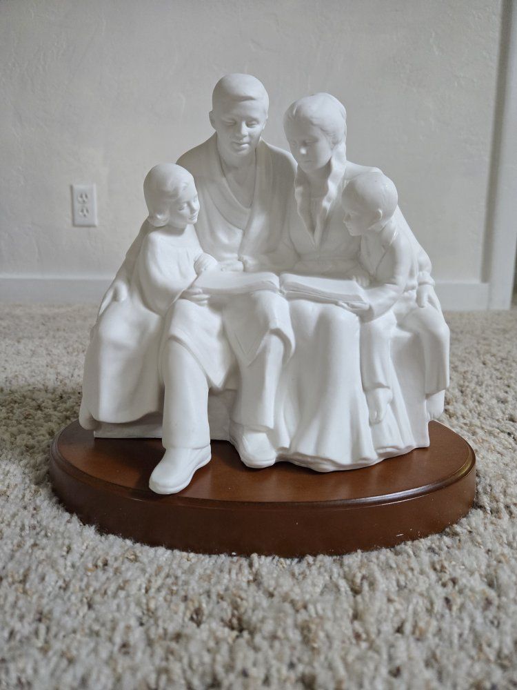White Porcelain Family Reading Figurine Sculpture on Wooden Base