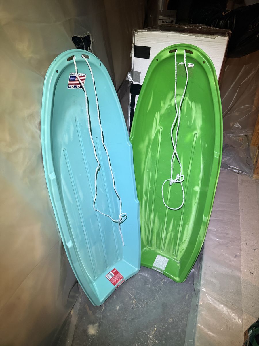 Pair of Used Plastic Snow Sleds - Green and Blue