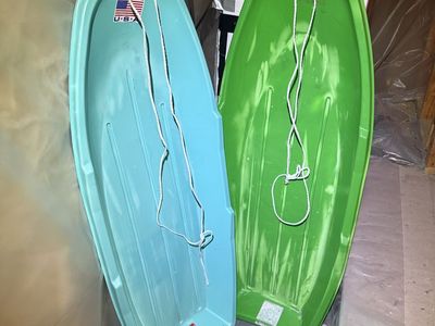 Pair of Used Plastic Snow Sleds - Green and Blue
