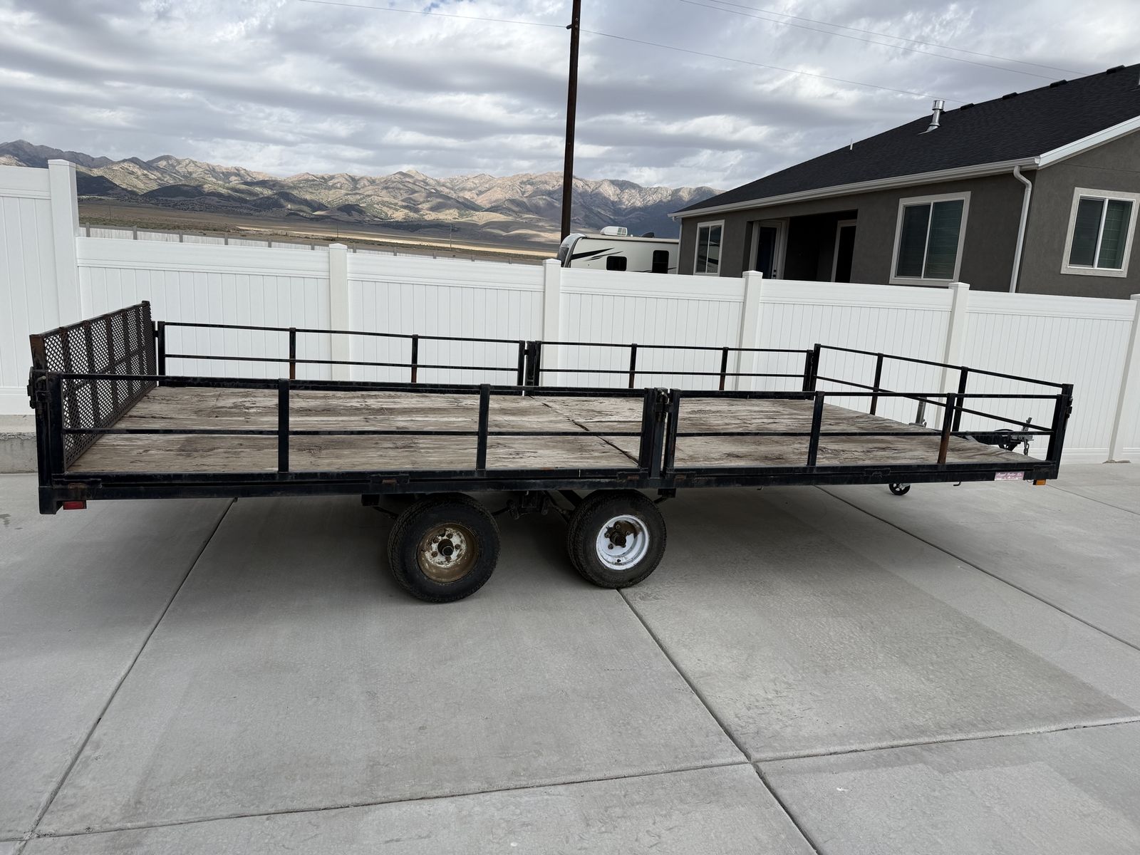 8x16 Flat Bed Utility Trailer with Fold-Down Sides - Versatile Hauling