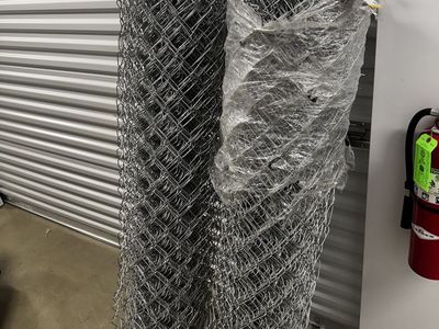 $100 each 60 in. x 50 ft. 11.5-Gauge Galvanized Steel Chain Link Fence Fabric