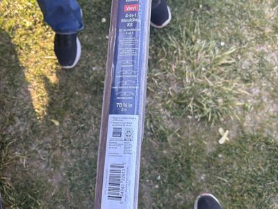 Several pieces of Project Source Vinyl 4-in-1 Moulding Kit - 78.75 in. T-Moulding, Carpet, Hard Surface Reducer, End Moulding