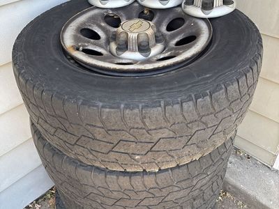 Chevy 6-Lug Steel Rims & Tires 265/70R17 with Hubcaps