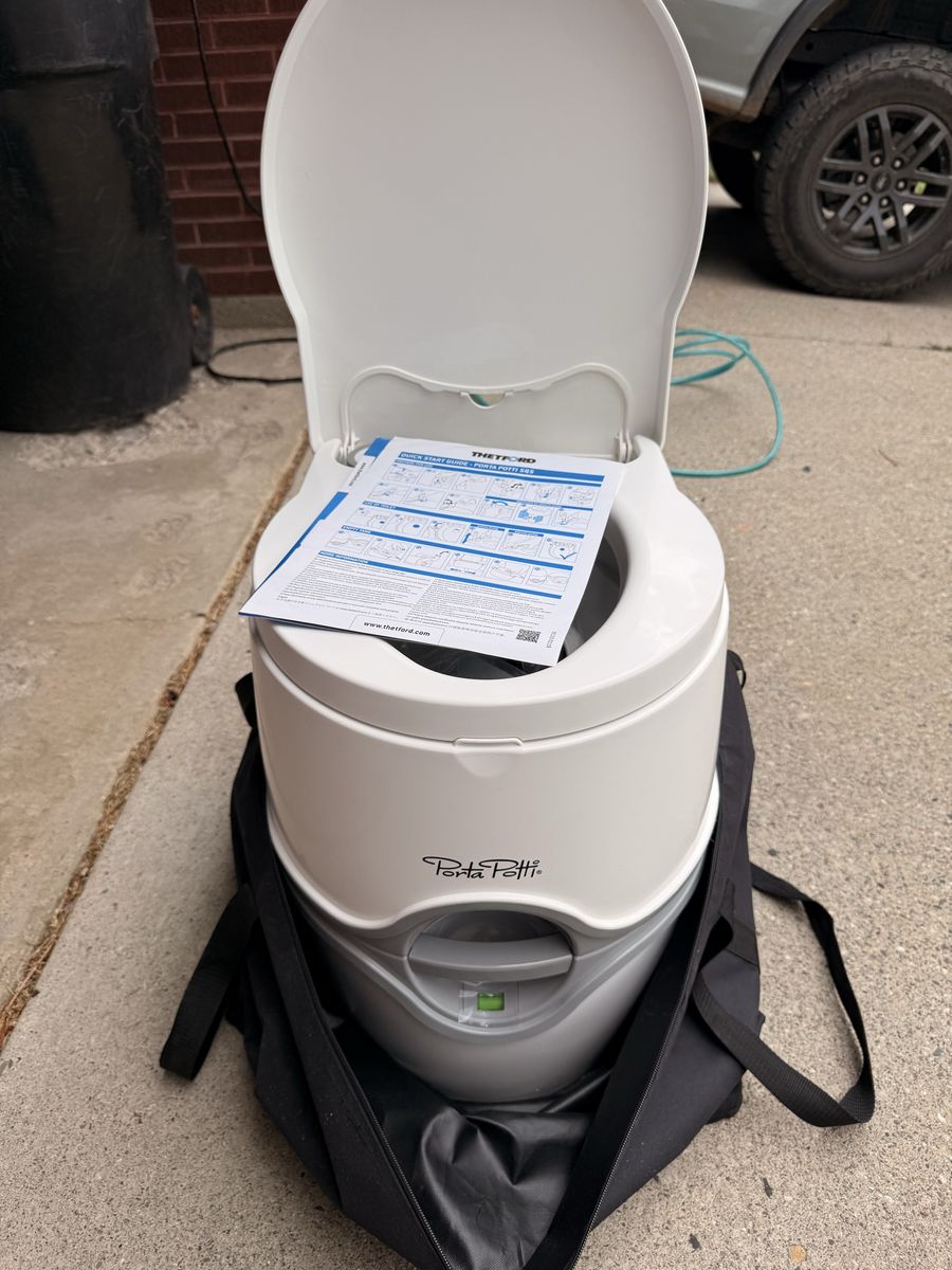 NEW - Thetford Porta Potti 565 Portable Toilet with Carry Bag