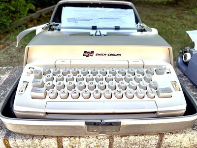 vintage SCM Smith-Corona Electra 120 portable electric portable typewriter with travel case