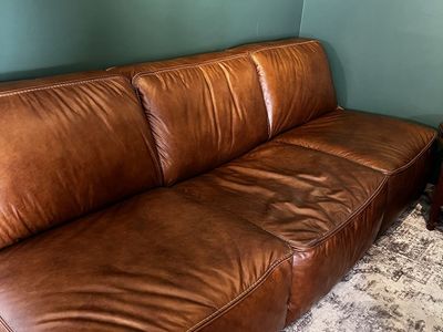 Armless Brown Leather Couch