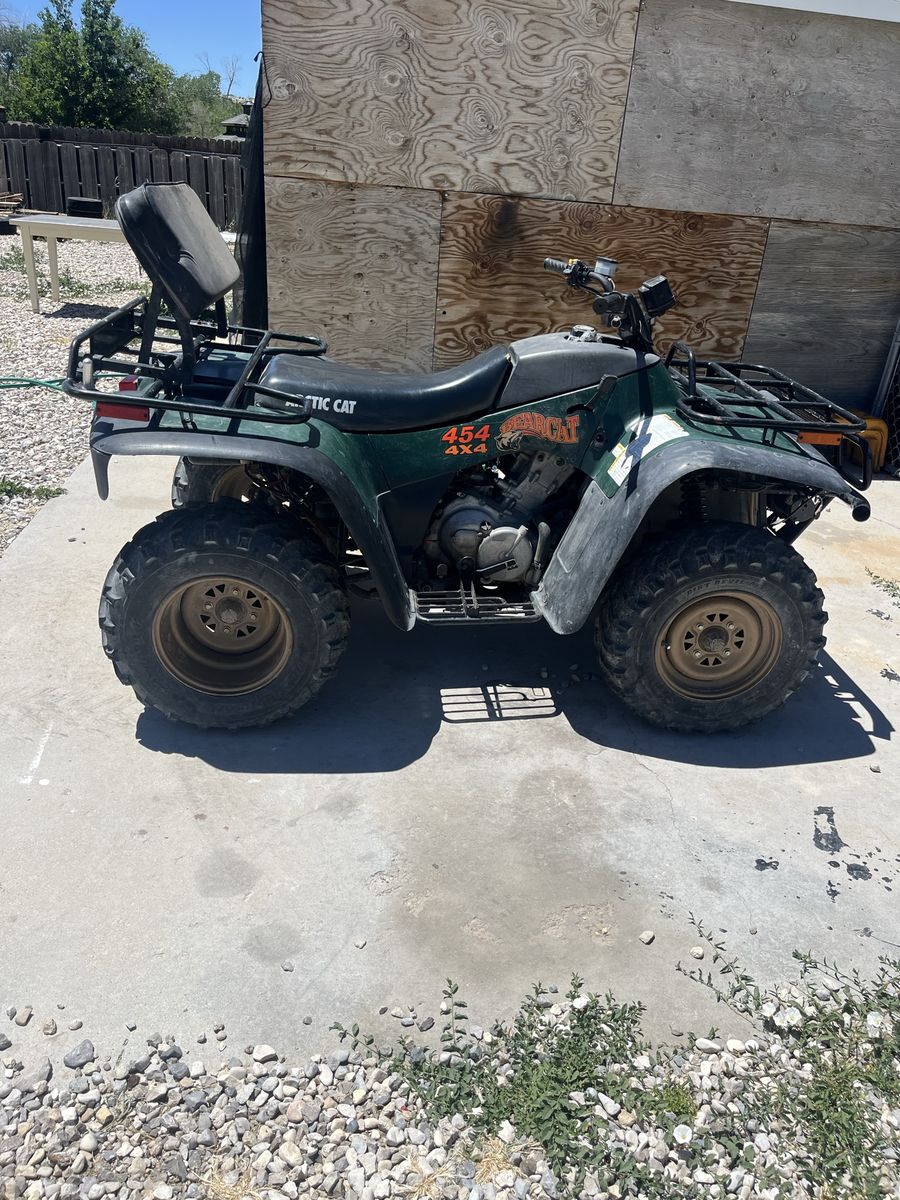 Both non running Arctic cat 454 and 400 4x5