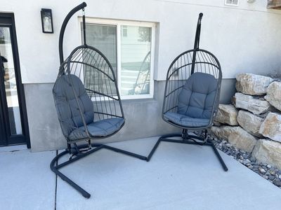 Pair of Hanging egg chairs with stand