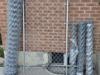 Chainlink fence roll and man gate