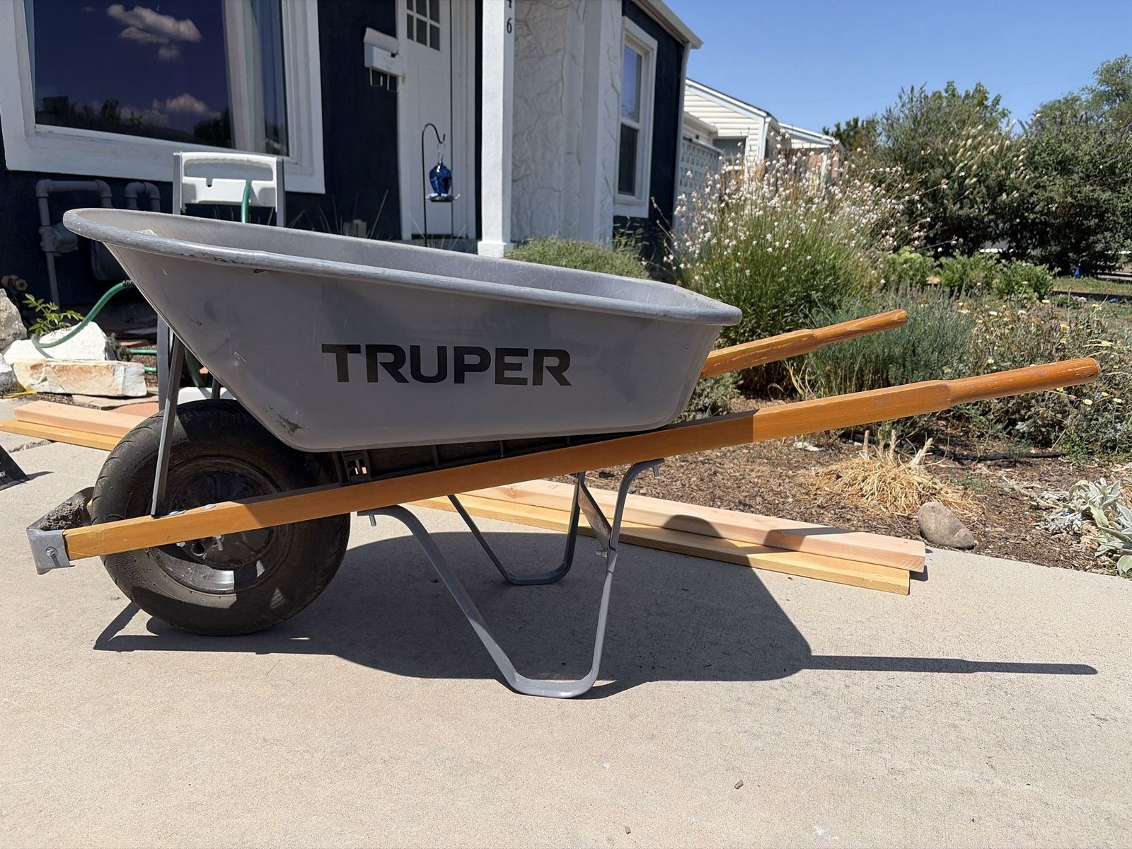 TRUPER Single-Wheel Wheelbarrow - Grey with Wooden Handles, Used for Yard Work