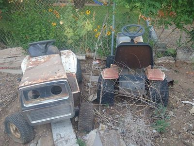 selling two old lawn mowers
