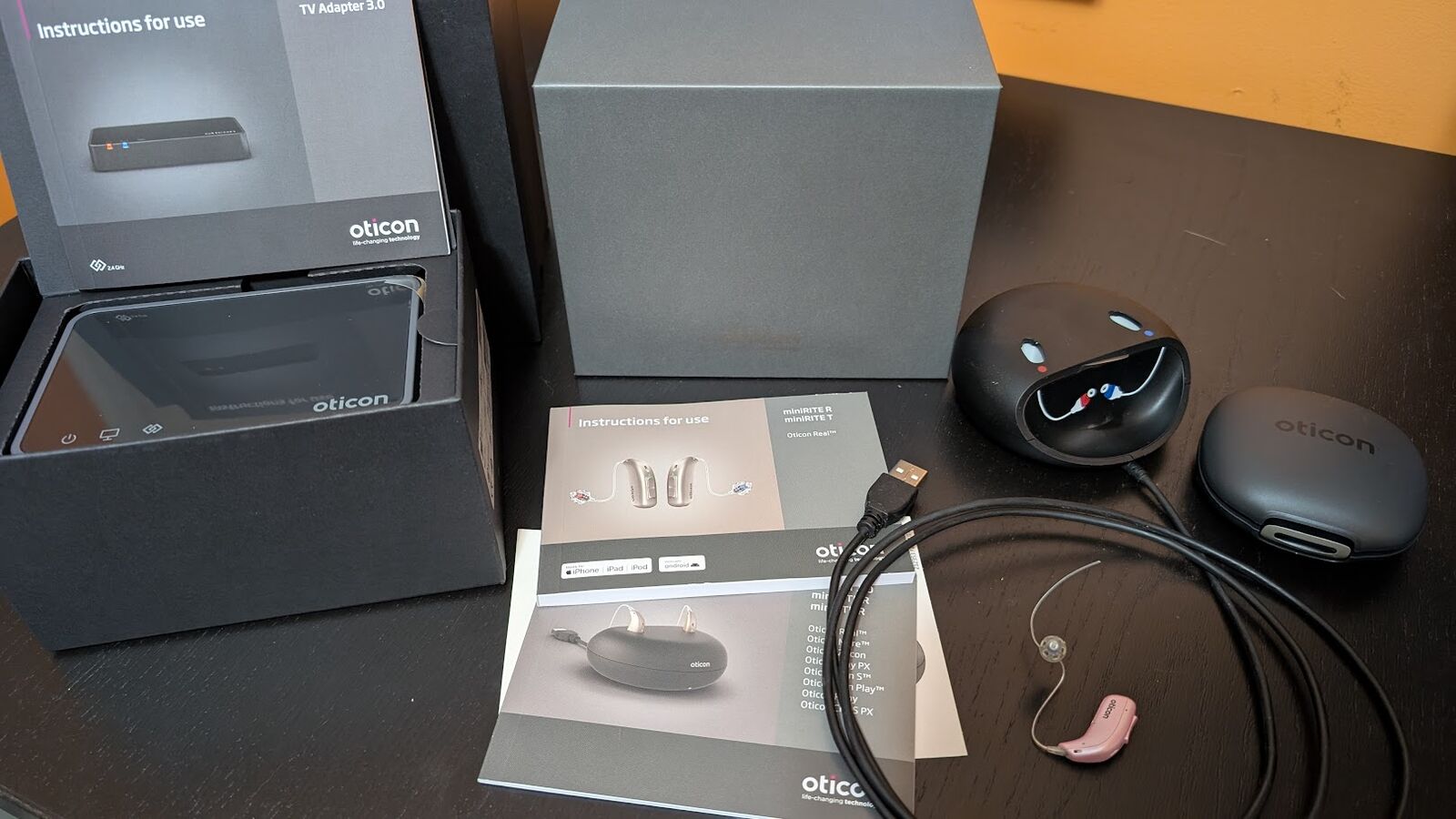 Oticon Real1 Hearing Aid (Pink, Left) with Charger & TV Adapter