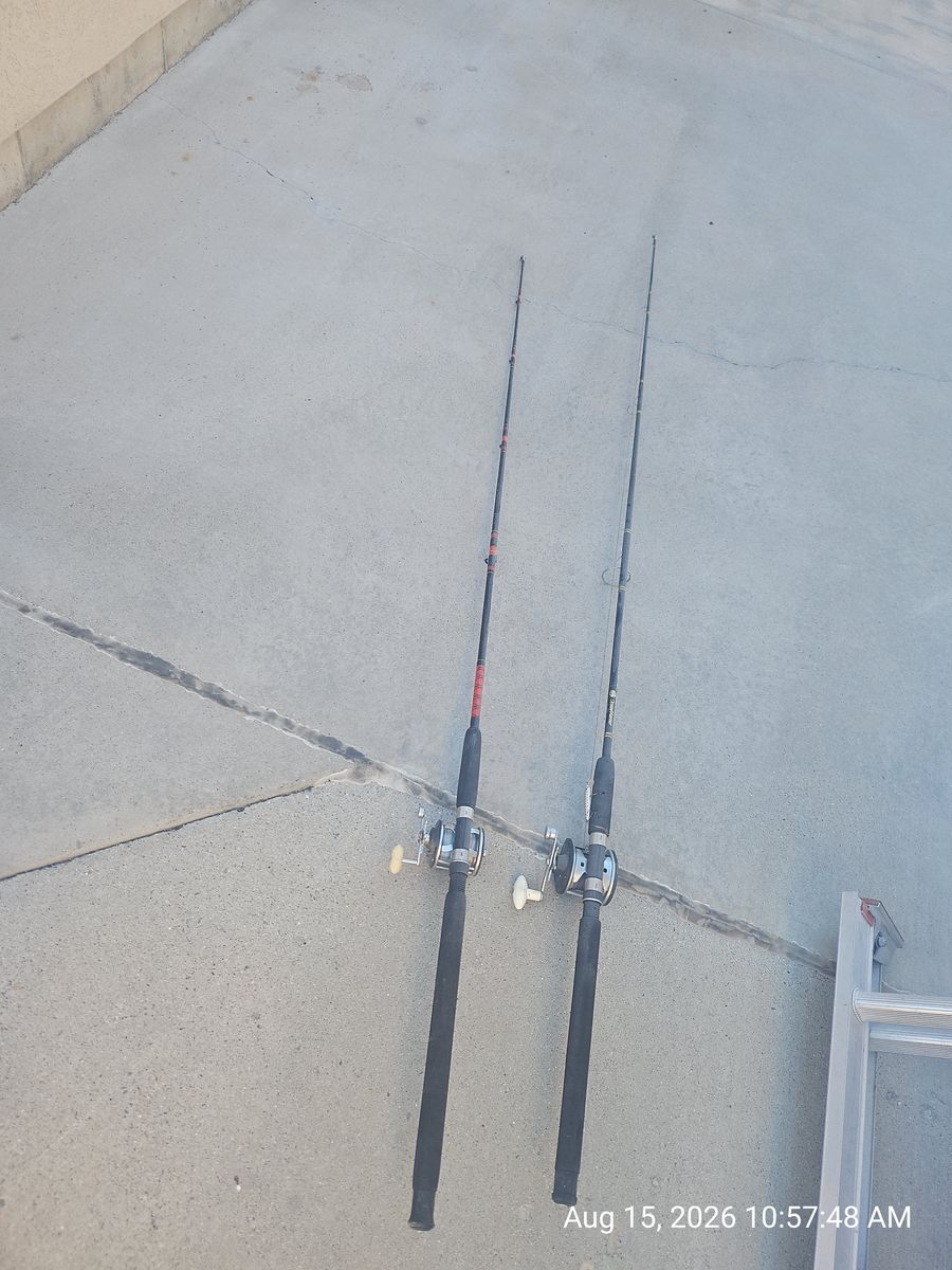 2 ea Used Trolling poles with Reels