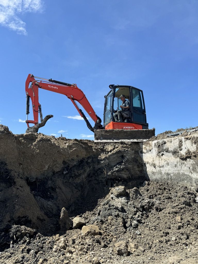 Kubota KX57-5 Mini Excavator for Rent - 12,000 lb Excavator with Angle Blade and Thumb