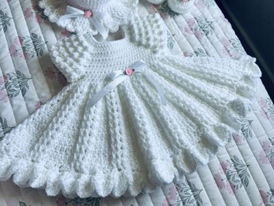 Beautiful white crochet baby dress set