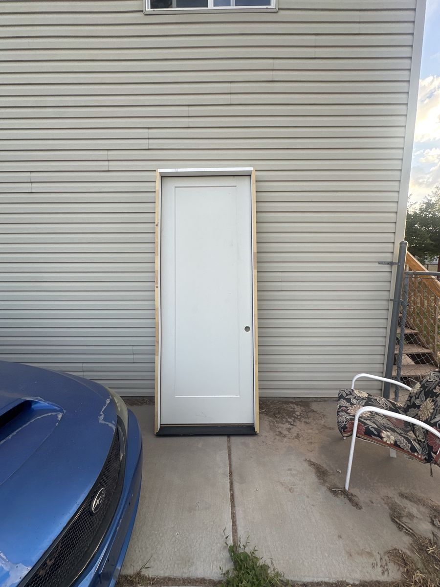 New 3'0" x 8'0" White 2-Panel Exterior Door - Unused, Ready for Installation
