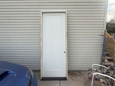 New 3'0" x 8'0" White 2-Panel Exterior Door - Unused, Ready for Installation