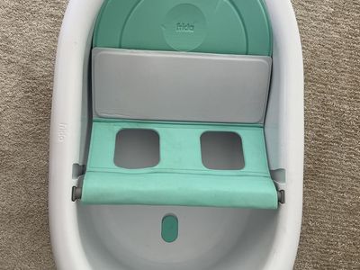 Frida Baby 4-in-1 Grow-With-Me Bathtub, White/Mint, Infant to Toddler, Adjustable Support