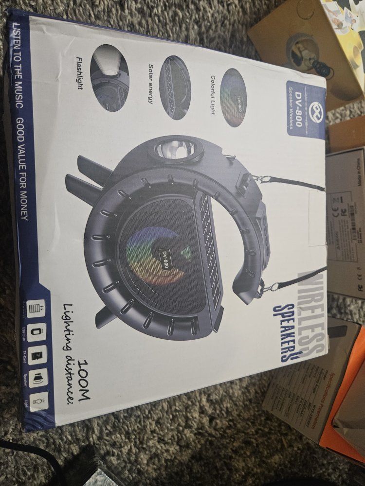 DV-800 Wireless Speaker with Flashlight, Solar Energy, and Colorful Light - New