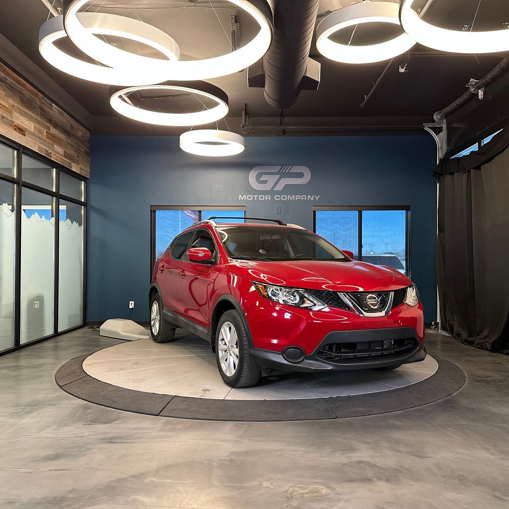 2018 Nissan Rogue Sport SV — rebuilt & branded title, 6% below market