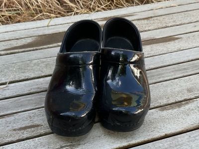 black glossy clogs