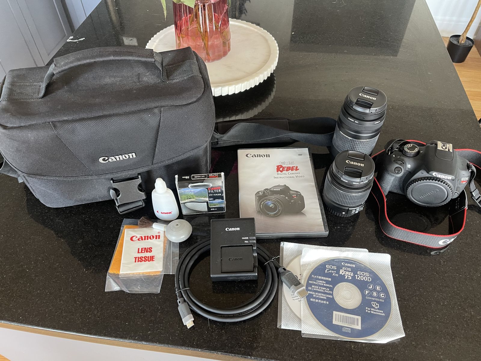 Canon Camera body with 18-55mm lense and 75-300mm lense