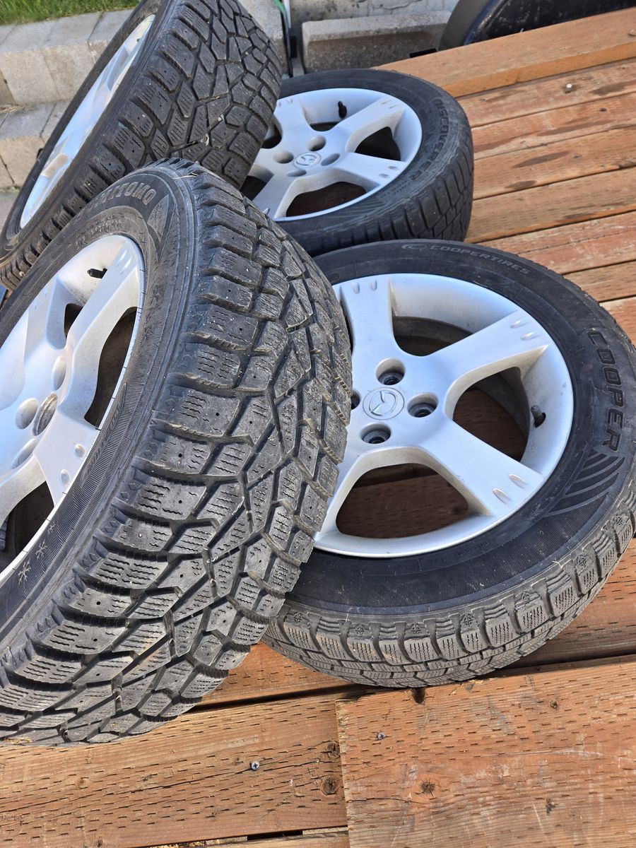 Mazda miata stock wheels  with snow tires
