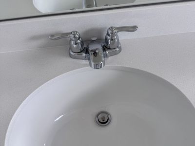 Chrome Bathroom Sink Faucet with Dual Handles - Used